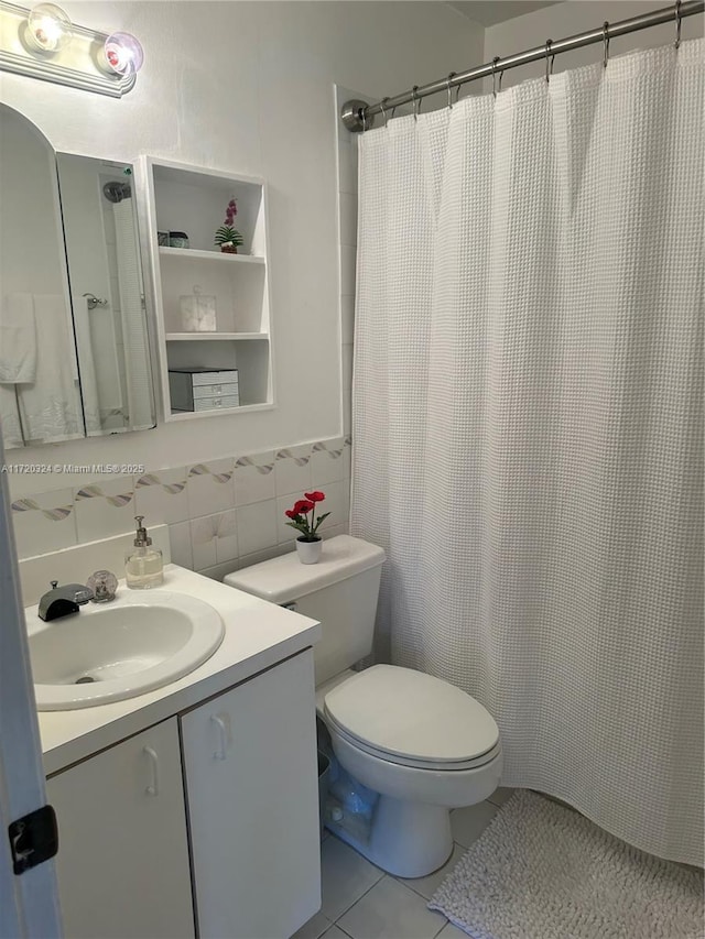 9920 SW 194th St, Cutler Bay, FL 33157 - full bath with tile walls, tile patterned floors, vanity, toilet, and a shower with curtain