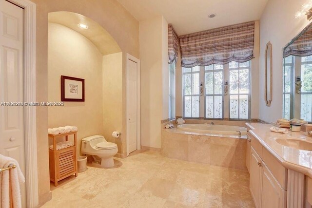 6139 Via Venetia S, Delray Beach, FL 33484 - bathroom featuring a bath, vanity, and a bidet