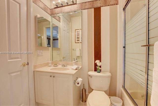 6139 Via Venetia S, Delray Beach, FL 33484 - full bathroom with vanity and shower / bath combination with glass door