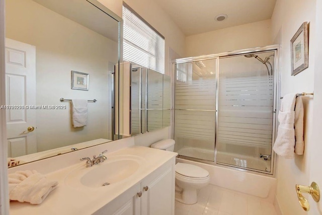 6139 Via Venetia S, Delray Beach, FL 33484 - full bathroom with vanity, bath / shower combo with glass door, and tile patterned floors