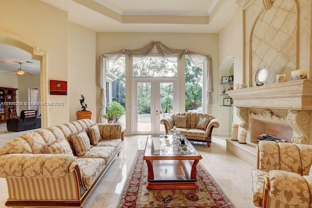 6139 Via Venetia S, Delray Beach, FL 33484 - living area featuring french doors, ceiling fan, crown molding, and a raised ceiling
