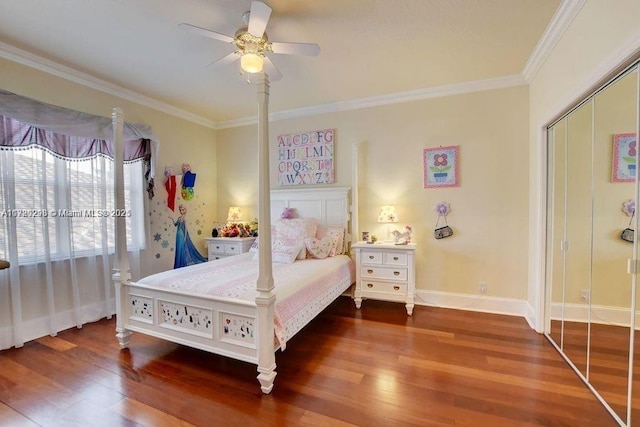 6139 Via Venetia S, Delray Beach, FL 33484 - bedroom with crown molding, wood finished floors, a ceiling fan, and a closet