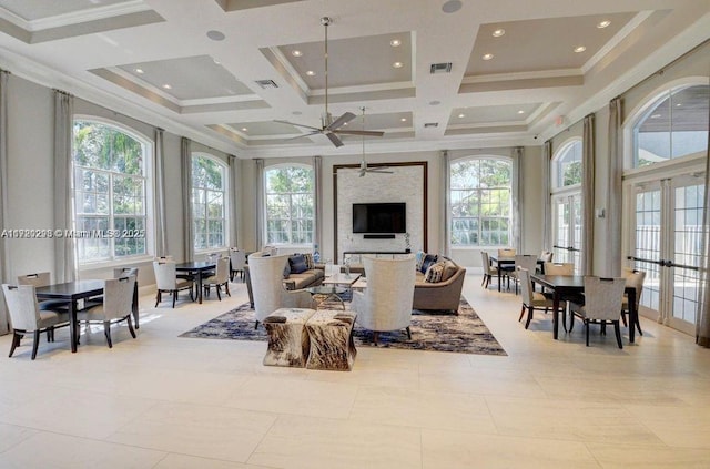 6139 Via Venetia S, Delray Beach, FL 33484 - living room featuring healthy amount of natural light, coffered ceiling, ceiling fan, ornamental molding, and french doors