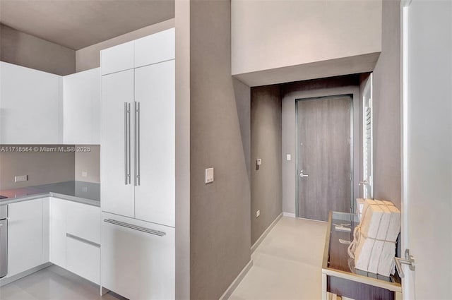 kitchen featuring white cabinetry