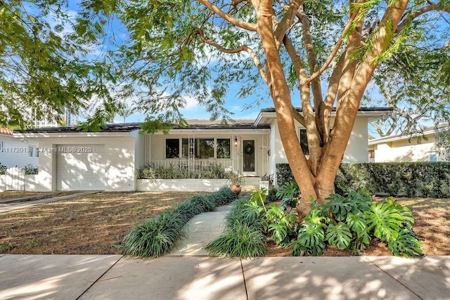 view of front of home featuring a garage