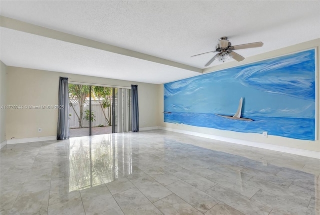 spare room featuring ceiling fan