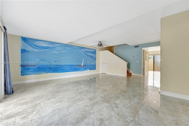 spare room featuring ceiling fan