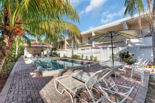 view of pool featuring a patio