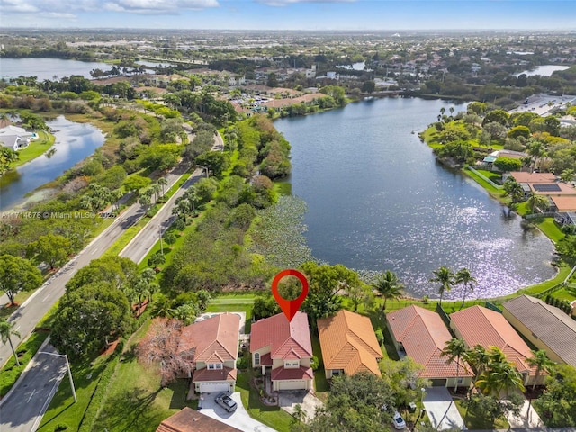 drone / aerial view featuring a water view