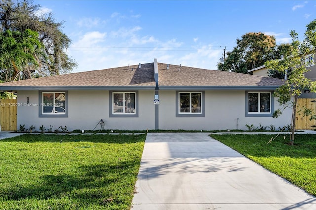 ranch-style home with a front yard