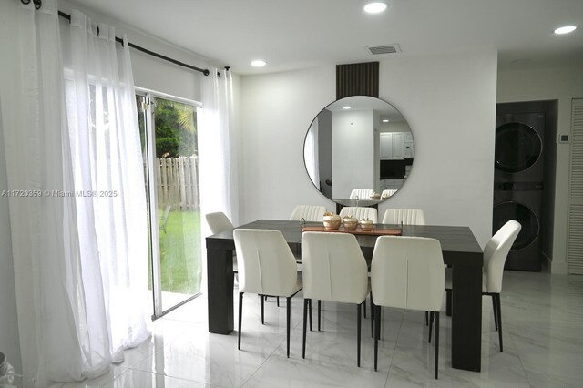 kitchen featuring white cabinets, white appliances, and backsplash