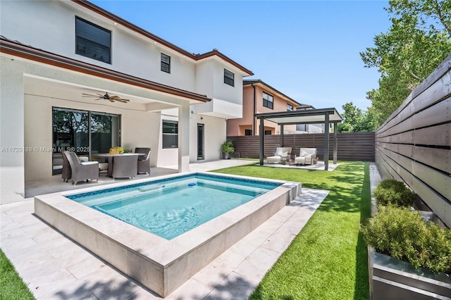 view of swimming pool featuring an outdoor living space, ceiling fan, and a patio area