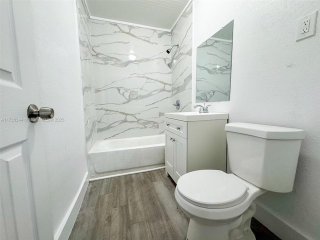 full bathroom with wood-type flooring, bathing tub / shower combination, vanity, and toilet