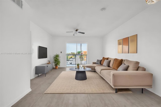 living room with ceiling fan