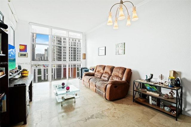 living room with a chandelier and floor to ceiling windows