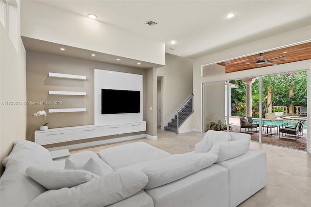 living room featuring ceiling fan