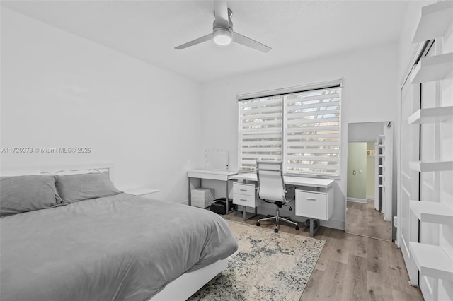 bedroom with ceiling fan and light wood-type flooring