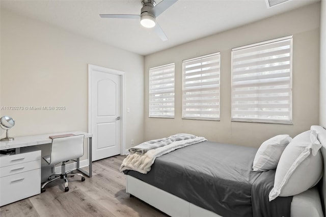 bedroom featuring light wood-type flooring and ceiling fan