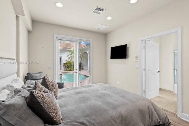 bedroom with access to outside and french doors