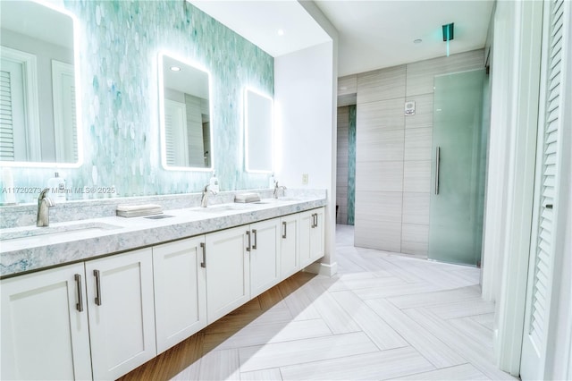 bathroom featuring vanity and walk in shower