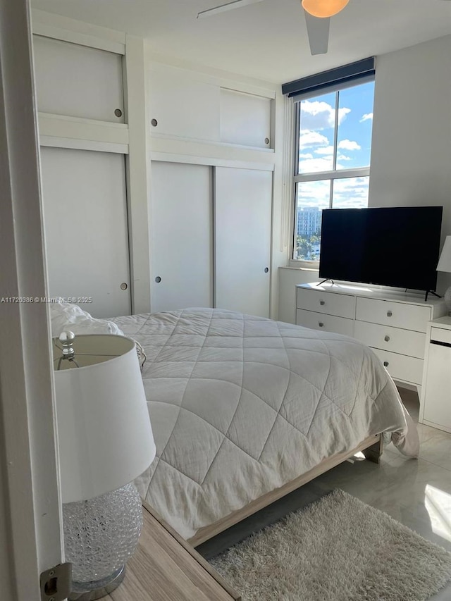 bedroom featuring ceiling fan