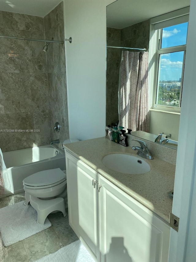 full bathroom with vanity, toilet, and shower / tub combo