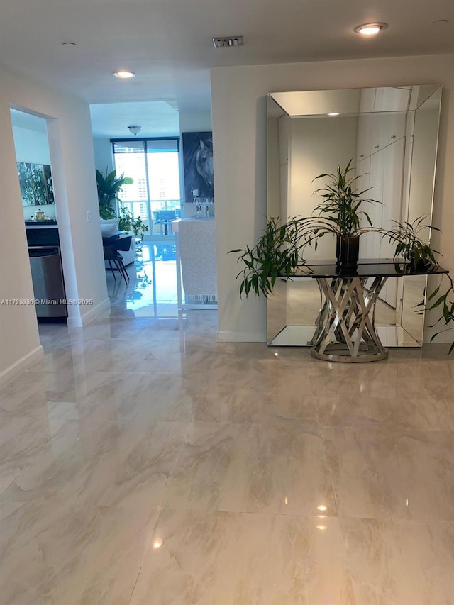 3340 NE 190th St Unit 1101, Aventura, FL 33180 - hallway with baseboards and marble finish flooring