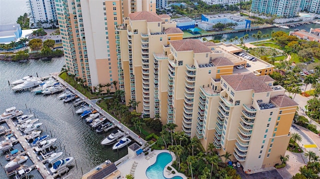 birds eye view of property with a water view