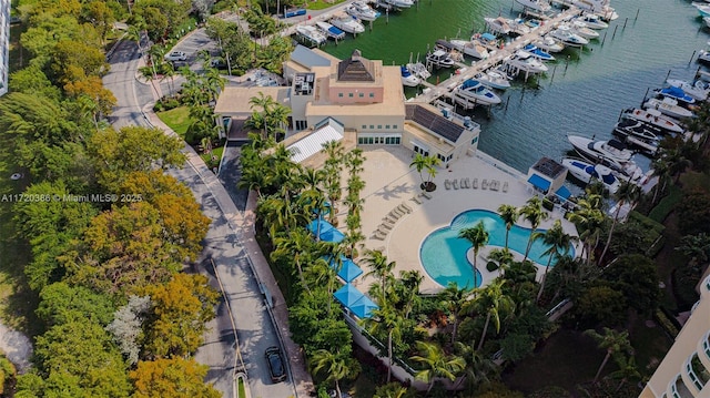 birds eye view of property featuring a water view