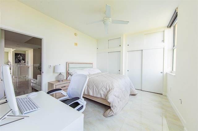 3340 NE 190th St Unit 1101, Aventura, FL 33180 - bedroom with multiple closets and ceiling fan