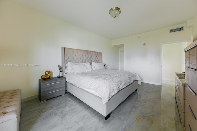 3340 NE 190th St Unit 1101, Aventura, FL 33180 - bedroom featuring light marble finish flooring and baseboards
