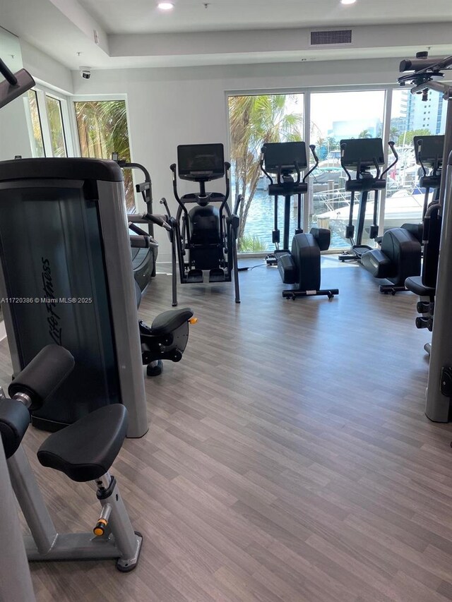 3340 NE 190th St Unit 1101, Aventura, FL 33180 - exercise room featuring wood finished floors and recessed lighting