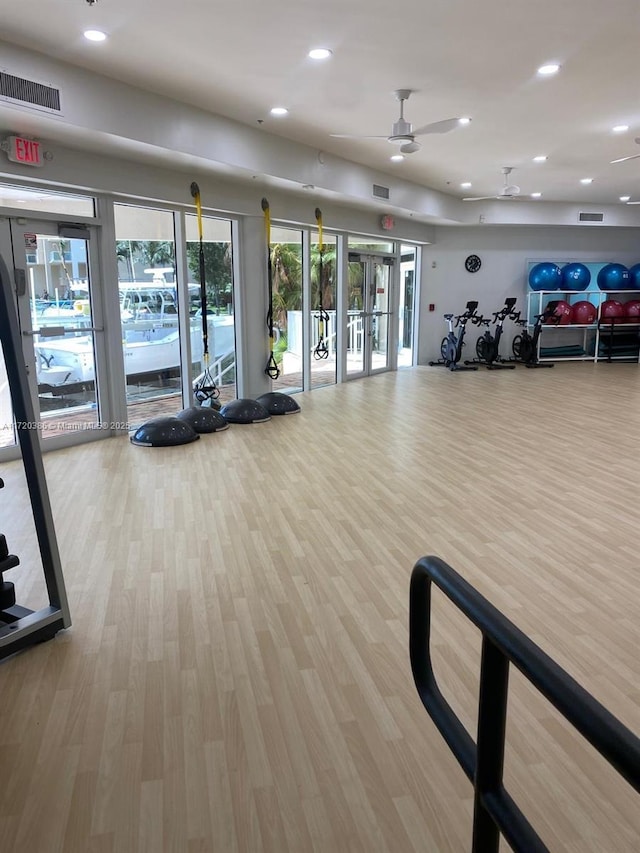 3340 NE 190th St Unit 1101, Aventura, FL 33180 - gym with wood finished floors, ceiling fan, recessed lighting, and french doors