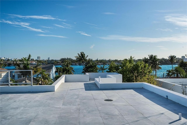 view of patio / terrace featuring a water view