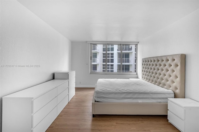 bedroom featuring hardwood / wood-style flooring