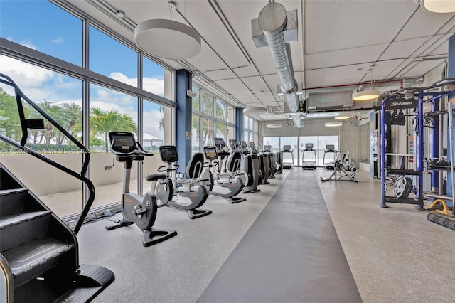 workout area featuring expansive windows