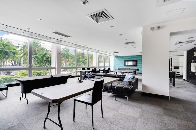 dining space with expansive windows