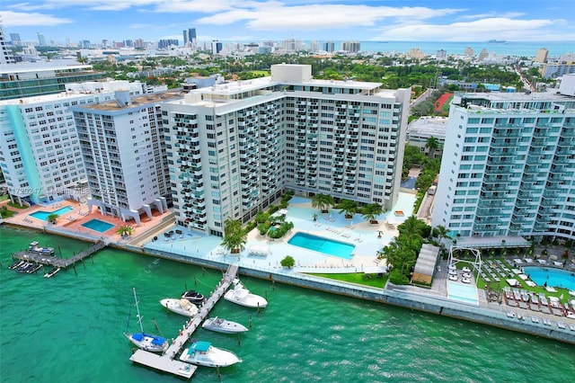 birds eye view of property featuring a water view