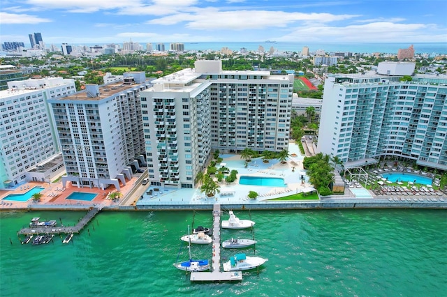 birds eye view of property featuring a water view