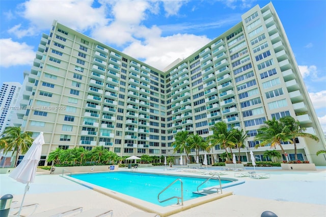 view of swimming pool featuring a patio area