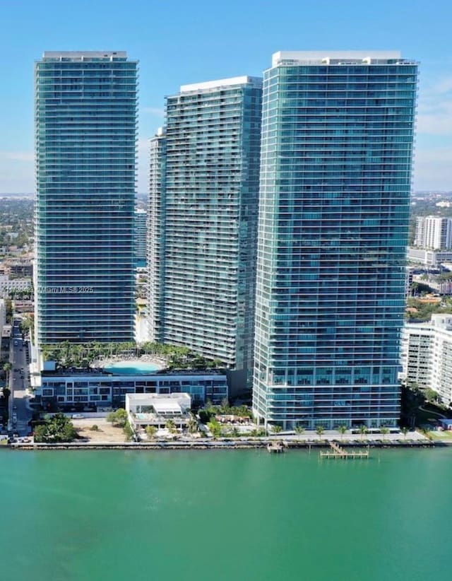 view of building exterior featuring a water view