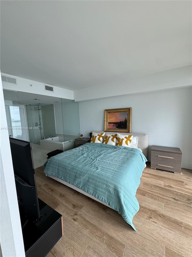 650 NE 32nd St Unit 1805, Miami, FL 33137 - bedroom featuring wood finished floors
