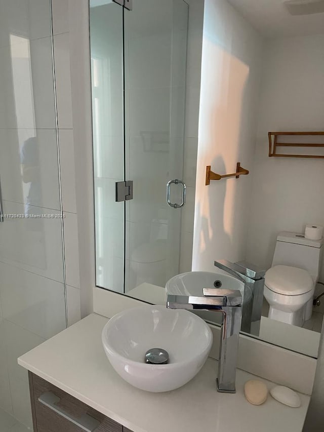 650 NE 32nd St Unit 1805, Miami, FL 33137 - bathroom featuring a stall shower and vanity