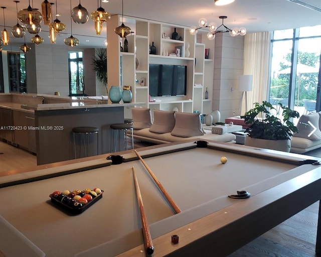 650 NE 32nd St Unit 1805, Miami, FL 33137 - recreation room with billiards, healthy amount of natural light, and a chandelier