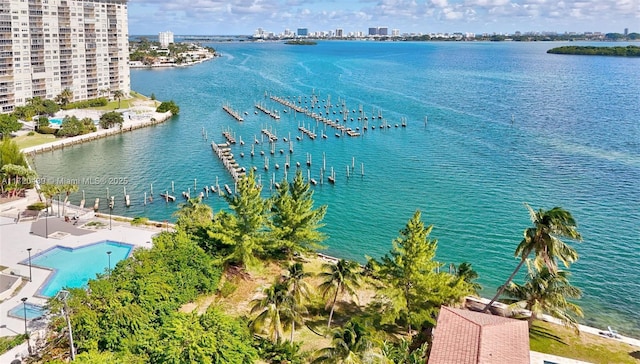 birds eye view of property featuring a water view