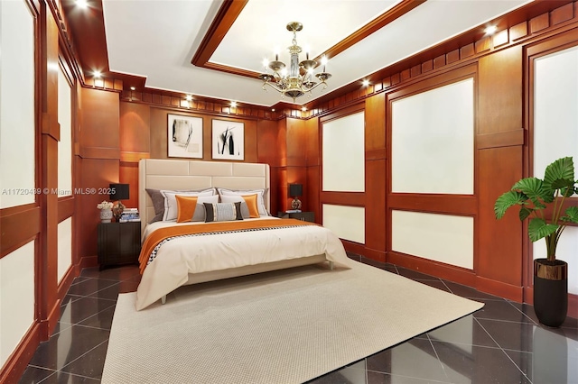 bedroom featuring an inviting chandelier