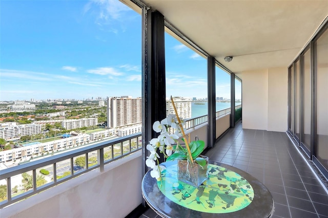 balcony featuring a water view