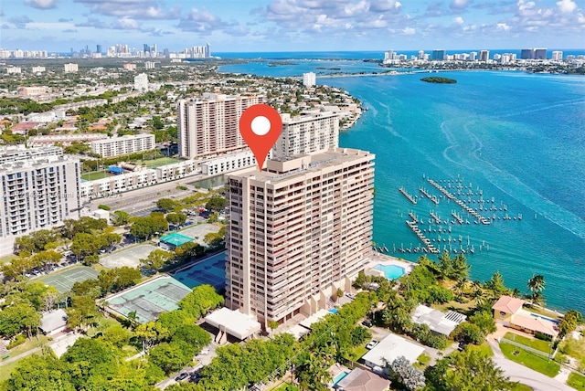 birds eye view of property featuring a water view