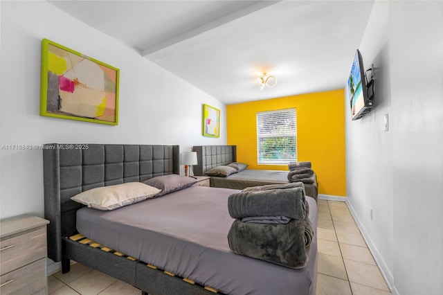 bedroom featuring light tile patterned floors