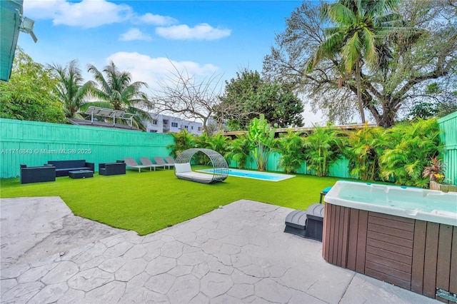 view of patio with an outdoor hangout area and a hot tub